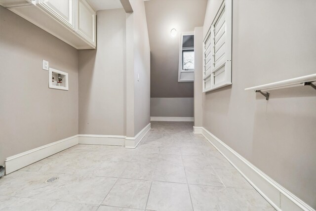 3126 Mid Ln, Houston, TX 77027 - washroom featuring hookup for a washing machine and cabinet space