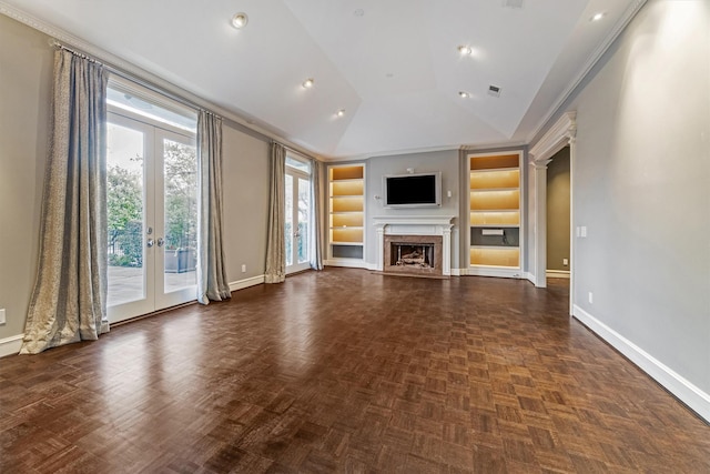 3126 Mid Ln, Houston, TX 77027 - unfurnished living room with built in features, a fireplace, vaulted ceiling, french doors, and recessed lighting