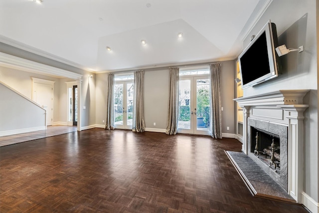 3126 Mid Ln, Houston, TX 77027 - unfurnished living room with a high end fireplace, lofted ceiling, french doors, and recessed lighting