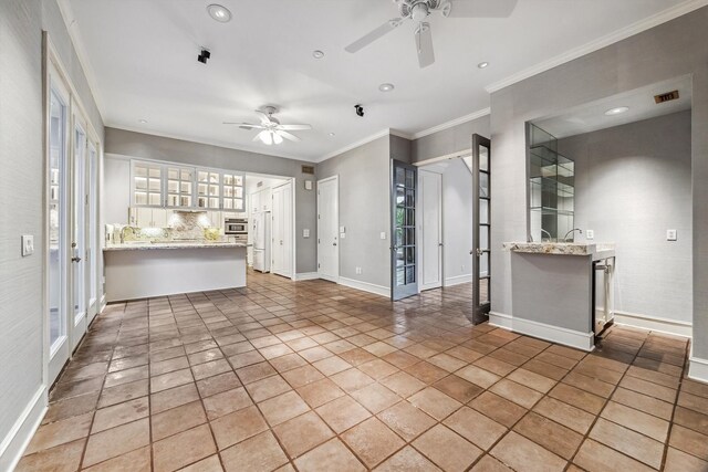 3126 Mid Ln, Houston, TX 77027 - unfurnished living room with a ceiling fan, crown molding, and recessed lighting
