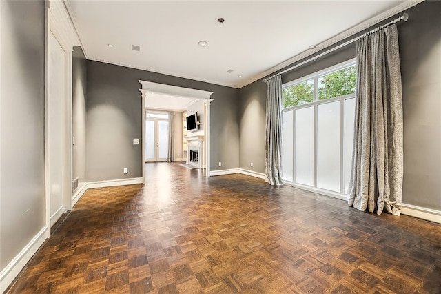 3126 Mid Ln, Houston, TX 77027 - spare room featuring crown molding and a fireplace