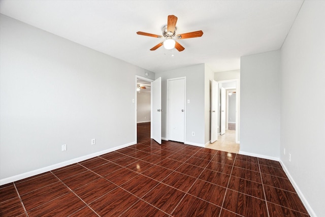 4029 Briar Hollow Dr, Dickinson, TX 77539 - unfurnished bedroom featuring baseboards and ceiling fan