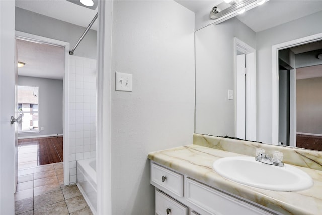 4029 Briar Hollow Dr, Dickinson, TX 77539 - bathroom featuring tile patterned floors, shower / bathing tub combination, and vanity