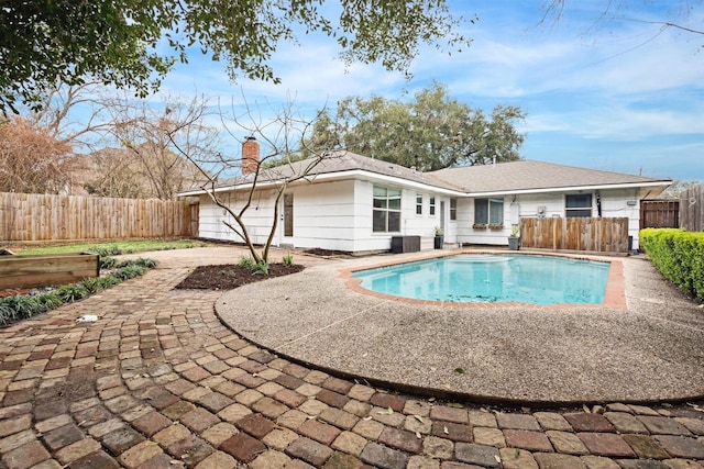 3427 Linkwood Dr, Houston, TX 77025 - view of pool with a fenced backyard, a patio, and cooling unit