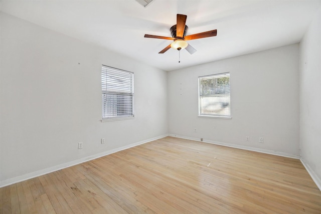3427 Linkwood Dr, Houston, TX 77025 - empty room with light wood-type flooring, ceiling fan, and baseboards
