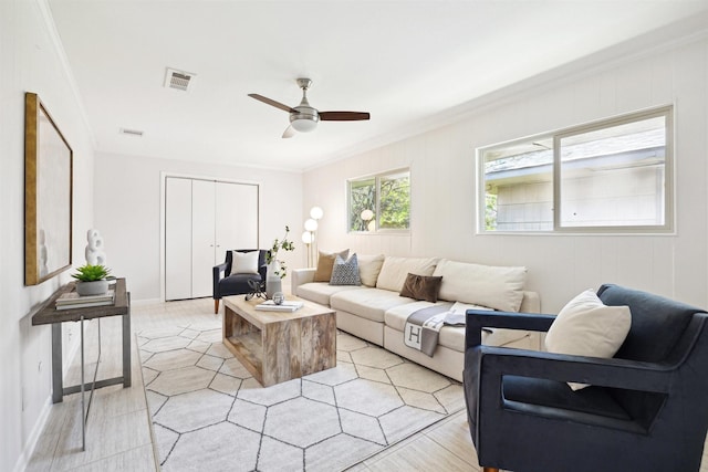 3427 Linkwood Dr, Houston, TX 77025 - living room featuring ceiling fan, crown molding, and light wood-style flooring