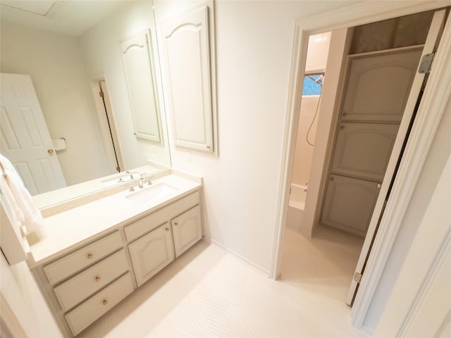 full bath with baseboards, shower / bathtub combination, and vanity