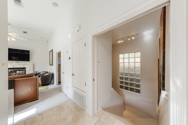 hallway featuring visible vents