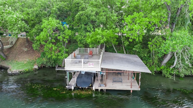 view of dock with a water view and boat lift