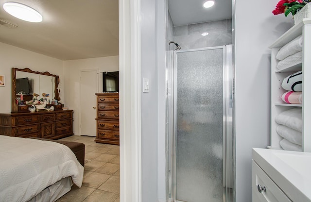 8503 Mcavoy Dr, Houston, TX 77074 - bathroom with visible vents, a shower stall, vanity, and tile patterned flooring