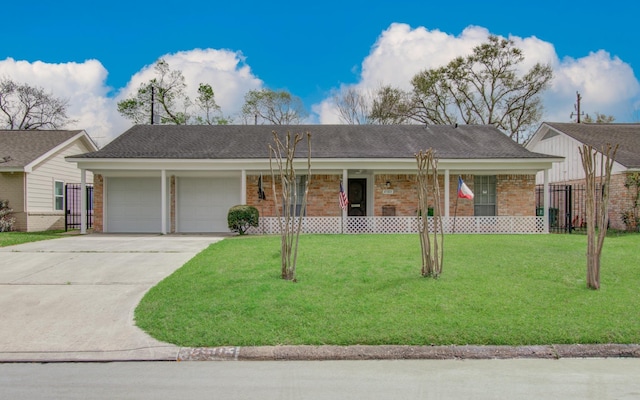 8503 Mcavoy Dr, Houston, TX 77074 - ranch-style home featuring fence, driveway, a front lawn, a garage, and brick siding