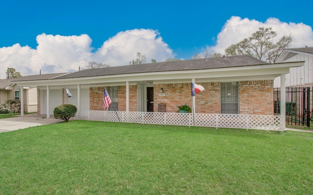 8503 Mcavoy Dr, Houston, TX 77074 - ranch-style house featuring fence, an attached garage, a front lawn, concrete driveway, and brick siding
