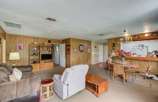 8503 Mcavoy Dr, Houston, TX 77074 - living area with visible vents and a chandelier