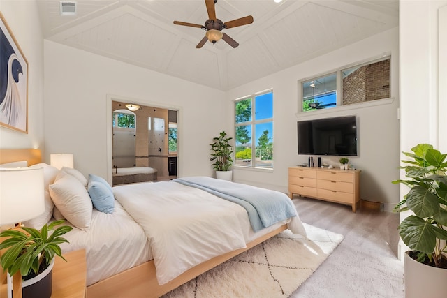bedroom with visible vents, a ceiling fan, and lofted ceiling
