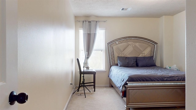 2202 Tandy Park Way, Houston, TX 77047 - carpeted bedroom with baseboards, visible vents, and a textured ceiling
