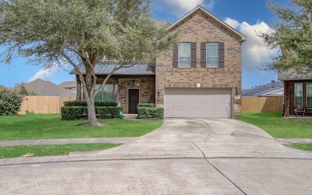 4919 Connor Dr, Baytown, TX 77521 - traditional-style home featuring brick siding, a garage, driveway, and a standing seam roof