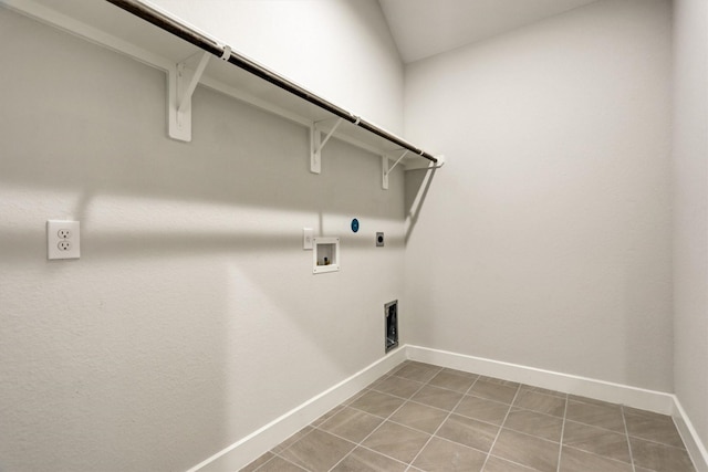 clothes washing area featuring electric dryer hookup, baseboards, gas dryer hookup, hookup for a washing machine, and laundry area
