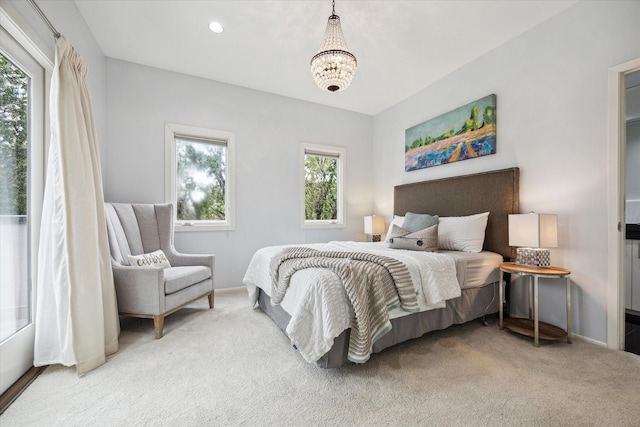 1395 Arlington St Unit 1395, Houston, TX 77008 - bedroom featuring carpet floors, a chandelier, and baseboards