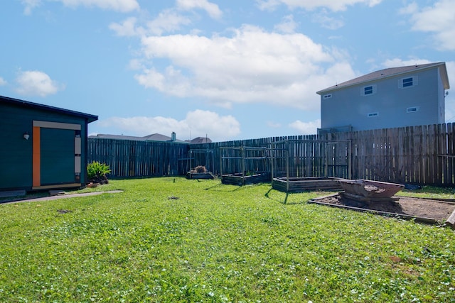 140 Ocean View Dr, Crystal Beach, TX 77650 - view of yard featuring a vegetable garden