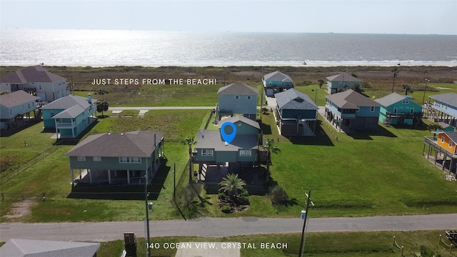 140 Ocean View Dr, Crystal Beach, TX 77650 - aerial view of residential area featuring waterfront with a beach