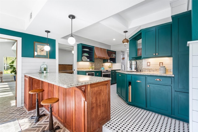 15407 Oaklawn Park Dr, Houston, TX 77069 - kitchen featuring open shelves, wall chimney exhaust hood, a peninsula, light stone counters, and decorative backsplash