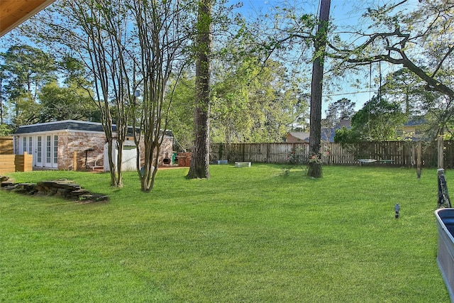 15407 Oaklawn Park Dr, Houston, TX 77069 - fenced backyard featuring an outbuilding
