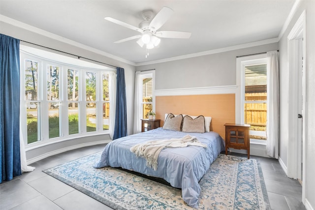 15407 Oaklawn Park Dr, Houston, TX 77069 - tiled bedroom with a ceiling fan and ornamental molding