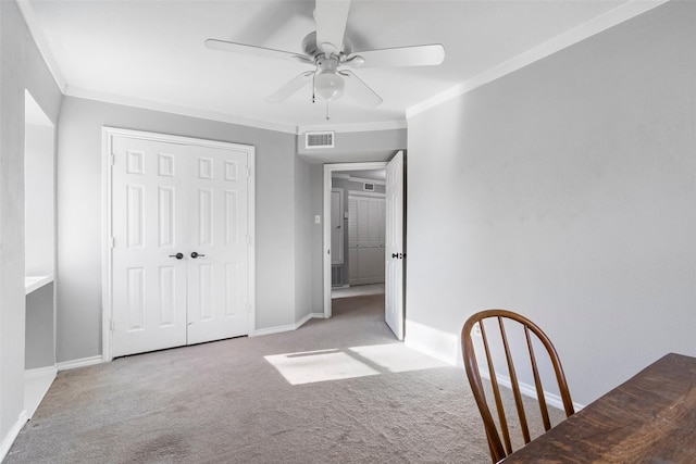 15407 Oaklawn Park Dr, Houston, TX 77069 - unfurnished dining area with carpet, a ceiling fan, and crown molding