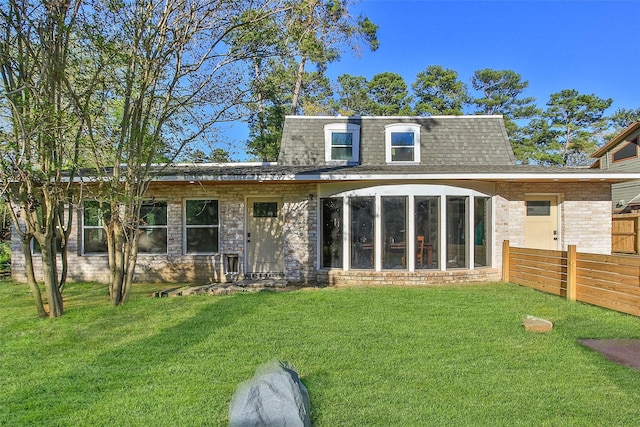 15407 Oaklawn Park Dr, Houston, TX 77069 - rear view of house with a shingled roof, stone siding, and mansard roof