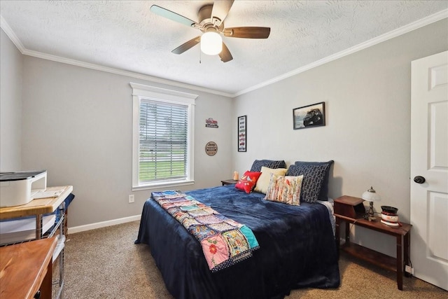 bedroom with ceiling fan, a textured ceiling, crown molding, baseboards, and carpet flooring