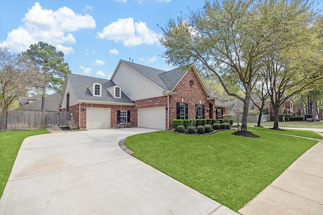 15502 Kellan Ct, Cypress, TX 77429 - view of front of house with brick siding, driveway, a garage, and roof with shingles