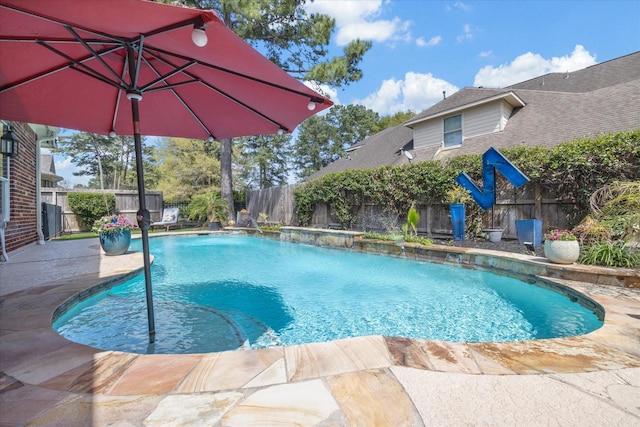 15502 Kellan Ct, Cypress, TX 77429 - view of swimming pool featuring a fenced backyard and a hot tub