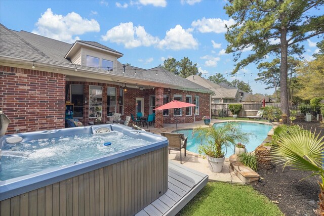 15502 Kellan Ct, Cypress, TX 77429 - view of pool with a hot tub, a fenced backyard, and a patio