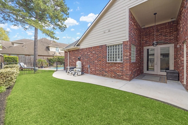 15502 Kellan Ct, Cypress, TX 77429 - view of yard featuring french doors and a patio