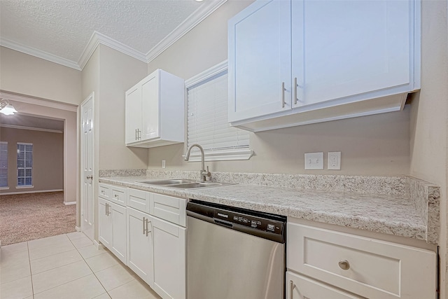 21403 Park Post Ln, Katy, TX 77450 - kitchen with dishwasher, light carpet, crown molding, light countertops, and light tile patterned flooring