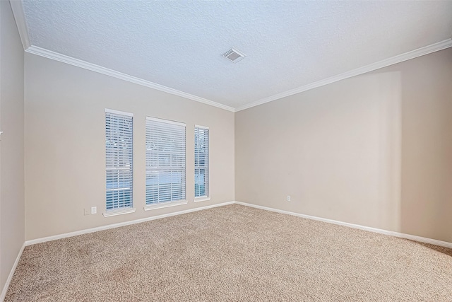 21403 Park Post Ln, Katy, TX 77450 - empty room featuring carpet floors, ornamental molding, and a textured ceiling