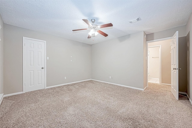 21403 Park Post Ln, Katy, TX 77450 - unfurnished room with a ceiling fan, carpet floors, and a textured ceiling