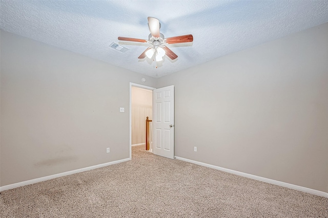 21403 Park Post Ln, Katy, TX 77450 - unfurnished bedroom with light colored carpet, a textured ceiling, and ceiling fan