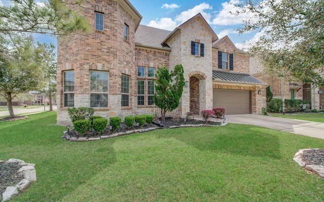 view of front of house featuring stone siding, driveway, a front yard, and a standing seam roof