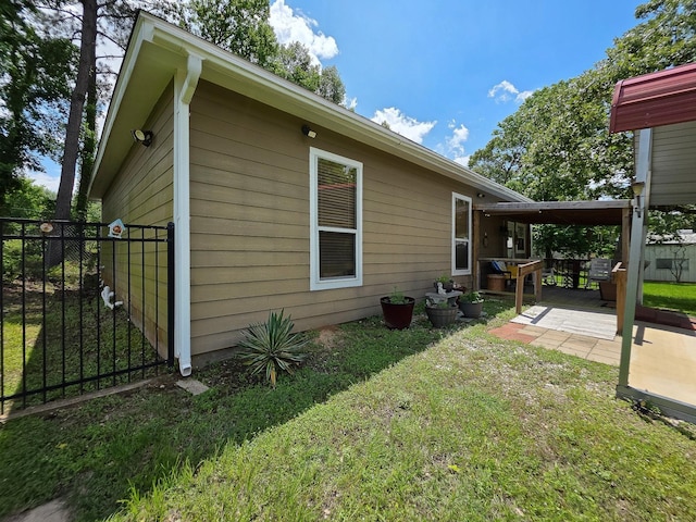 934 N Fm 356, Onalaska, TX 77360 - view of home's exterior featuring a patio area