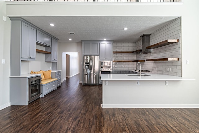 kitchen with open shelves, appliances with stainless steel finishes, beverage cooler, and gray cabinetry