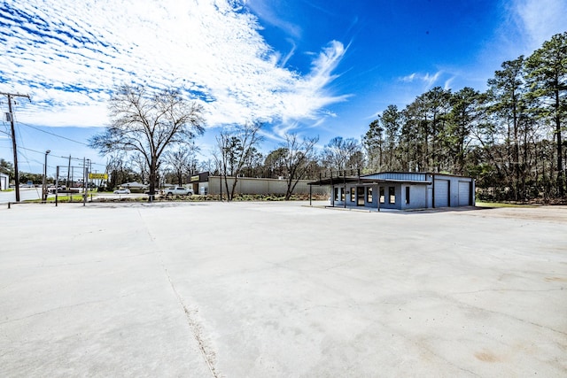 407 S Home St, Corrigan, TX 75939 - view of yard featuring a garage