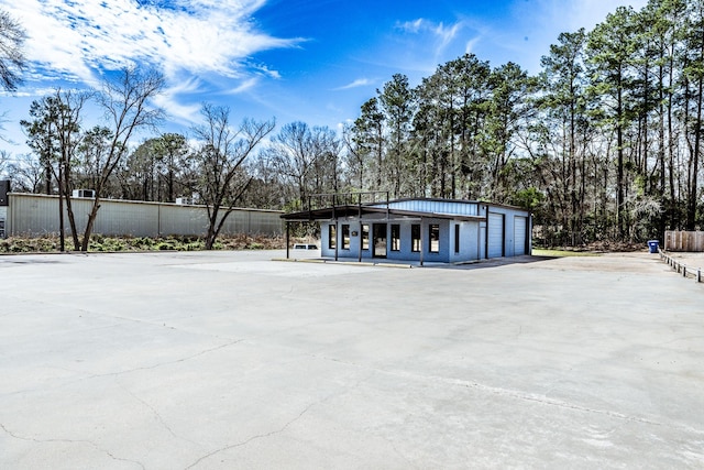 407 S Home St, Corrigan, TX 75939 - exterior space featuring a garage