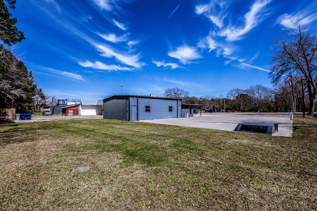407 S Home St, Corrigan, TX 75939 - view of yard with a garage and an outdoor structure