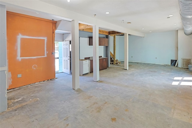 2025 Avenue N 1/2 Ave N 1/2, Galveston, TX 77550 - basement featuring stairs and recessed lighting