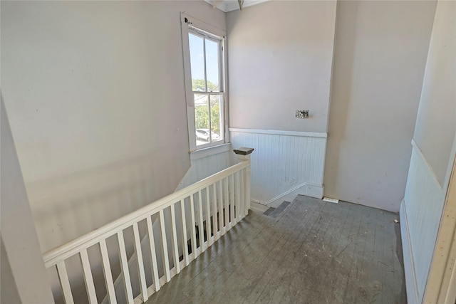 2025 Avenue N 1/2 Ave N 1/2, Galveston, TX 77550 - hallway with wainscoting, plenty of natural light, and an upstairs landing