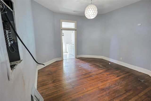 2025 Avenue N 1/2 Ave N 1/2, Galveston, TX 77550 - unfurnished room with wood-type flooring and baseboards