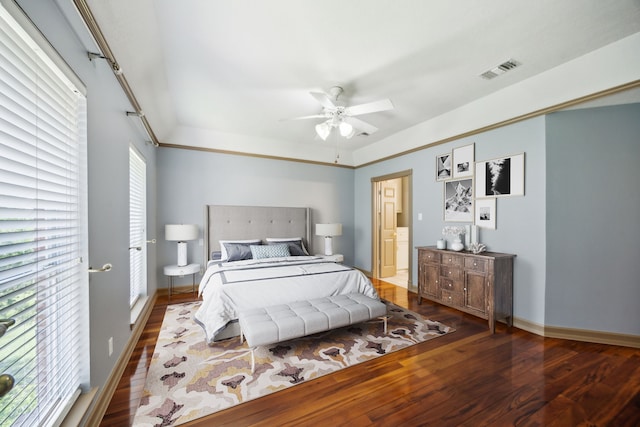 17207 Penick Rd, Waller, TX 77484 - bedroom featuring wood finished floors, ceiling fan, baseboards, and ensuite bath