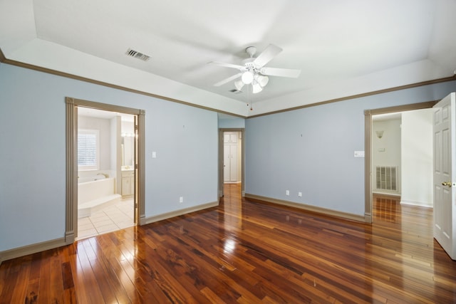 17207 Penick Rd, Waller, TX 77484 - unfurnished bedroom featuring wood-type flooring, baseboards, and ceiling fan