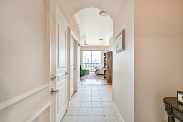 3333 Allen Pkwy Unit 1804, Houston, TX 77019 - corridor with light tile patterned floors, baseboards, and arched walkways